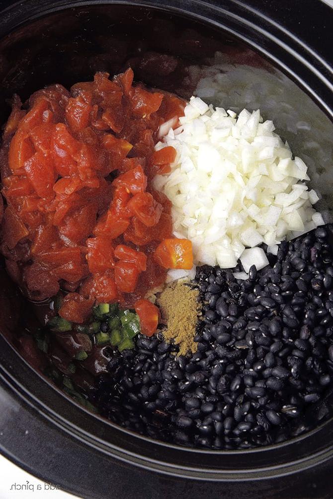 Ingredients for Black Bean Soup Recipe added to the slow cooker insert // puvez.com