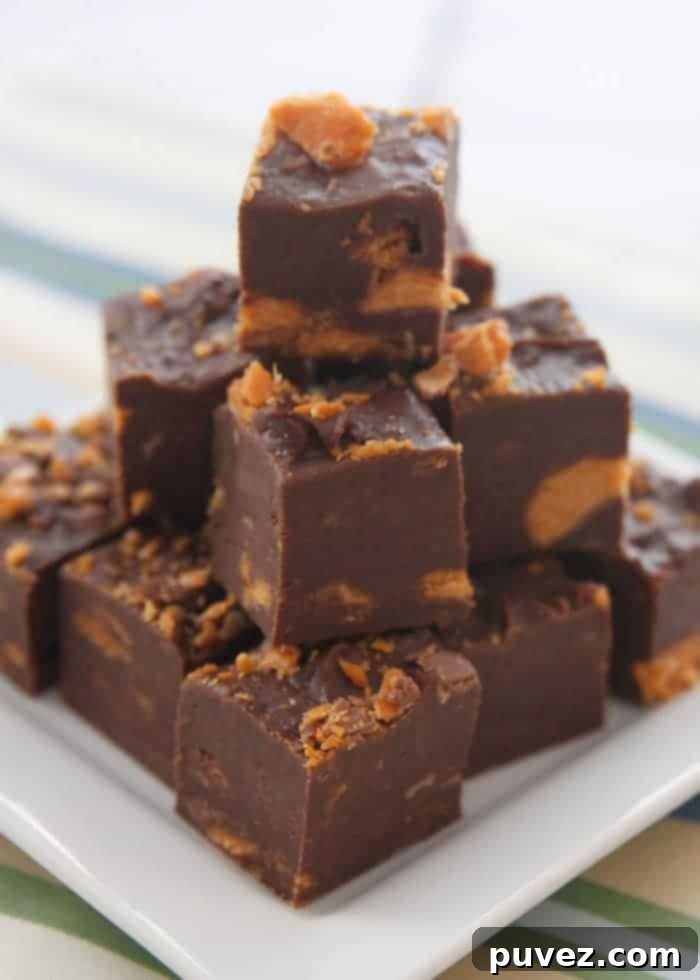 Delicious squares of 3-ingredient Butterfinger Fudge, ready to be enjoyed