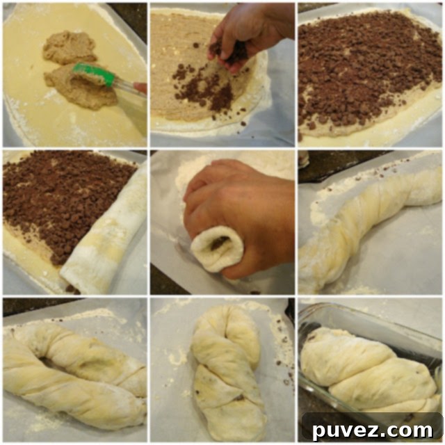 Babka dough being rolled out on parchment paper for filling
