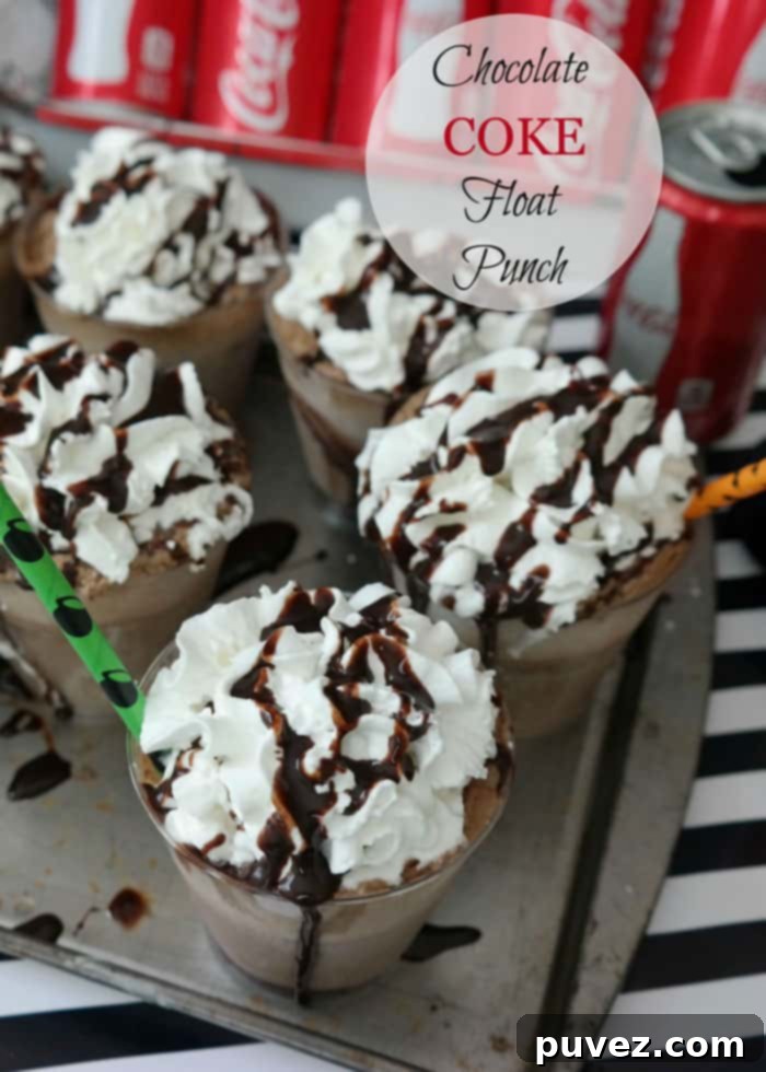 Chocolate Coke Float Punch-chocolate ice cream and Coke were a match made in heaven! Create a magical punch for your Halloween party!