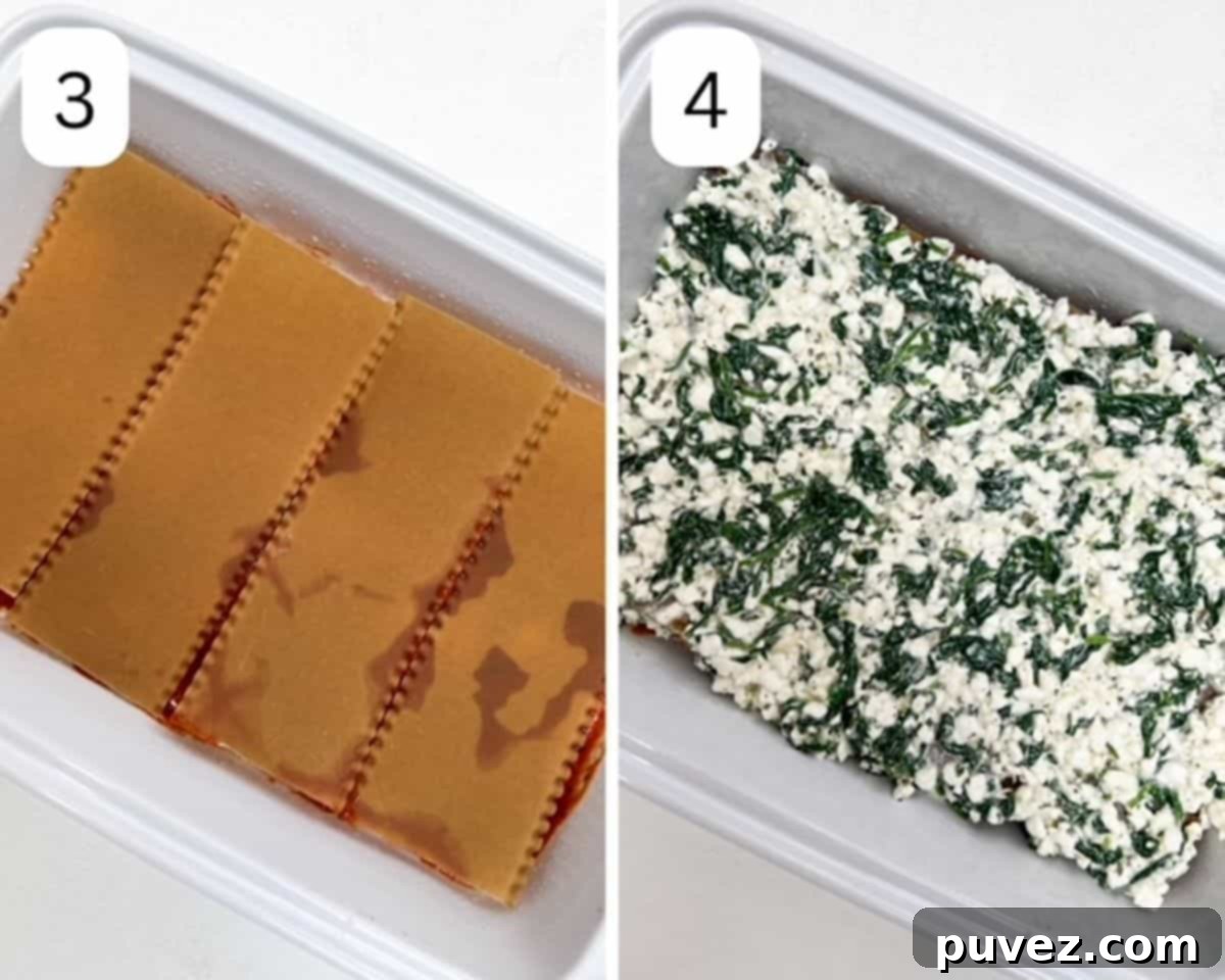 Four uncooked lasagna noodles over marinara sauce to the left, cottage cheese mixture over lasagna noodles to the right.