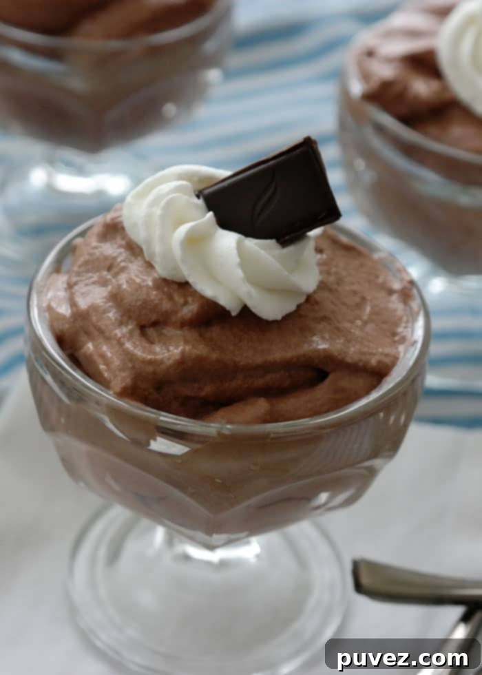 Easy Whipped Dark Chocolate Mousse-just 3 ingredients to create this delicate dessert, the secret is using good dark chocolate! Green & Black 70% Dark Chocolate makes this dessert decadent! 