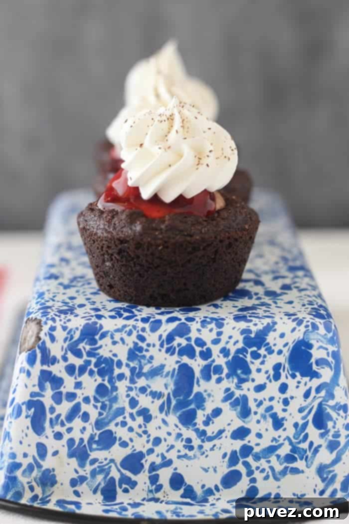Black Forest Cookie Cups - A delicious chocolate, cherry, and cream dessert.
