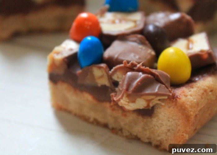 Leftover Halloween Candy Bars are totally appropriate for Thanksgiving dessert. If your stash of candy lasts that long!
