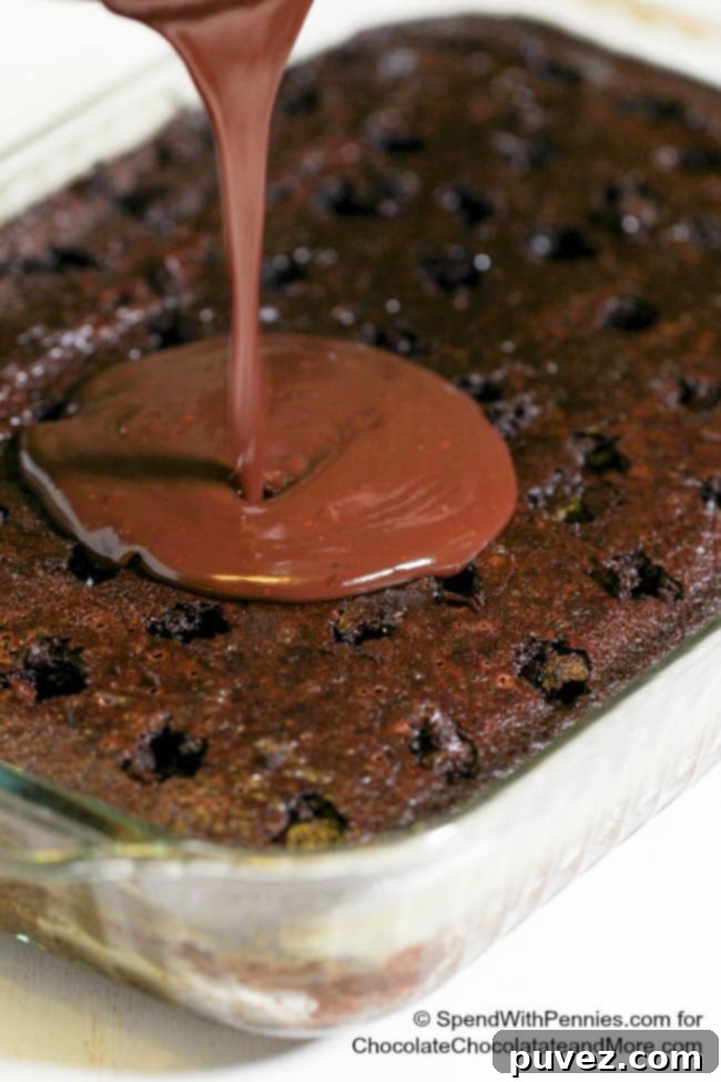 Close-up of Kahlua Chocolate Poke Cake slice revealing moist texture and pudding infusion