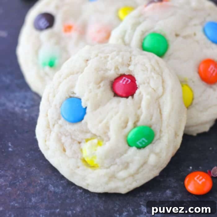 Melt in Your Mouth Soft and Chewy M&M Cookies 2 Perfectly Soft and Chewy M&M Cookies on a cooling rack