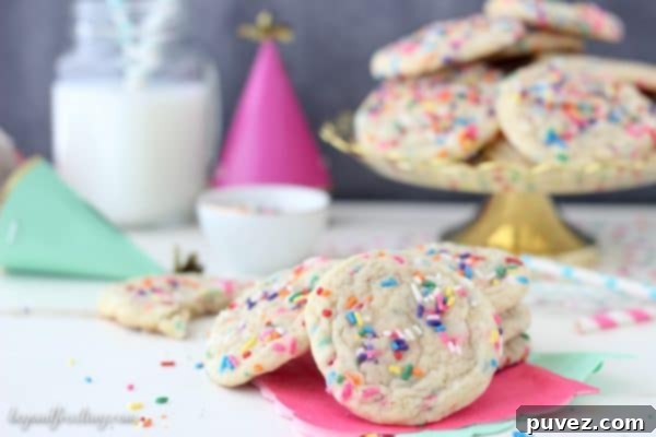 Perfectly baked sprinkle sugar cookies with golden edges and soft centers, ready to be enjoyed.