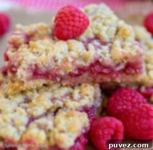 Raspberry Lemon Crumble Bars - A super easy recipe for sweet and tart raspberry crumble bars!