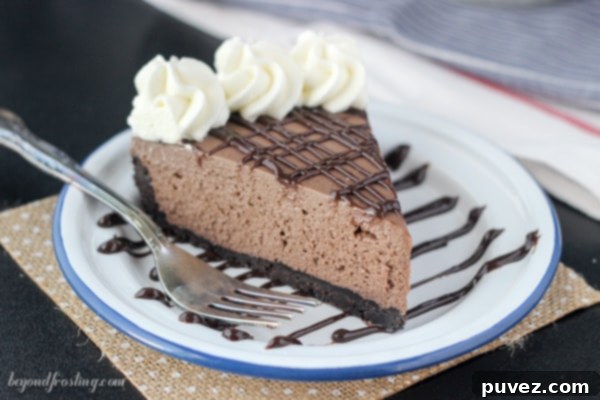 Gooey No-Bake Brownie Batter Cheesecake. A dense Oreo crust filled with a no-bake chocolate cheesecake made with brownie mix and topped with a brownie batter glaze.