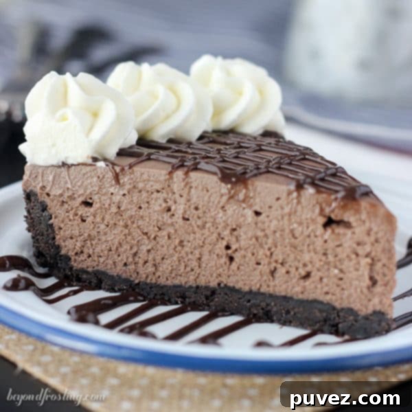 Gooey No-Bake Brownie Batter Cheesecake. A dense Oreo crust filled with a no-bake chocolate cheesecake made with brownie mix and topped with a brownie batter glaze.