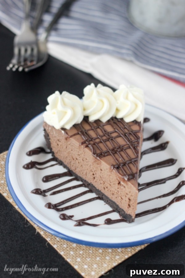 Gooey No-Bake Brownie Batter Cheesecake. A dense Oreo crust filled with a no-bake chocolate cheesecake made with brownie mix and topped with a brownie batter glaze.