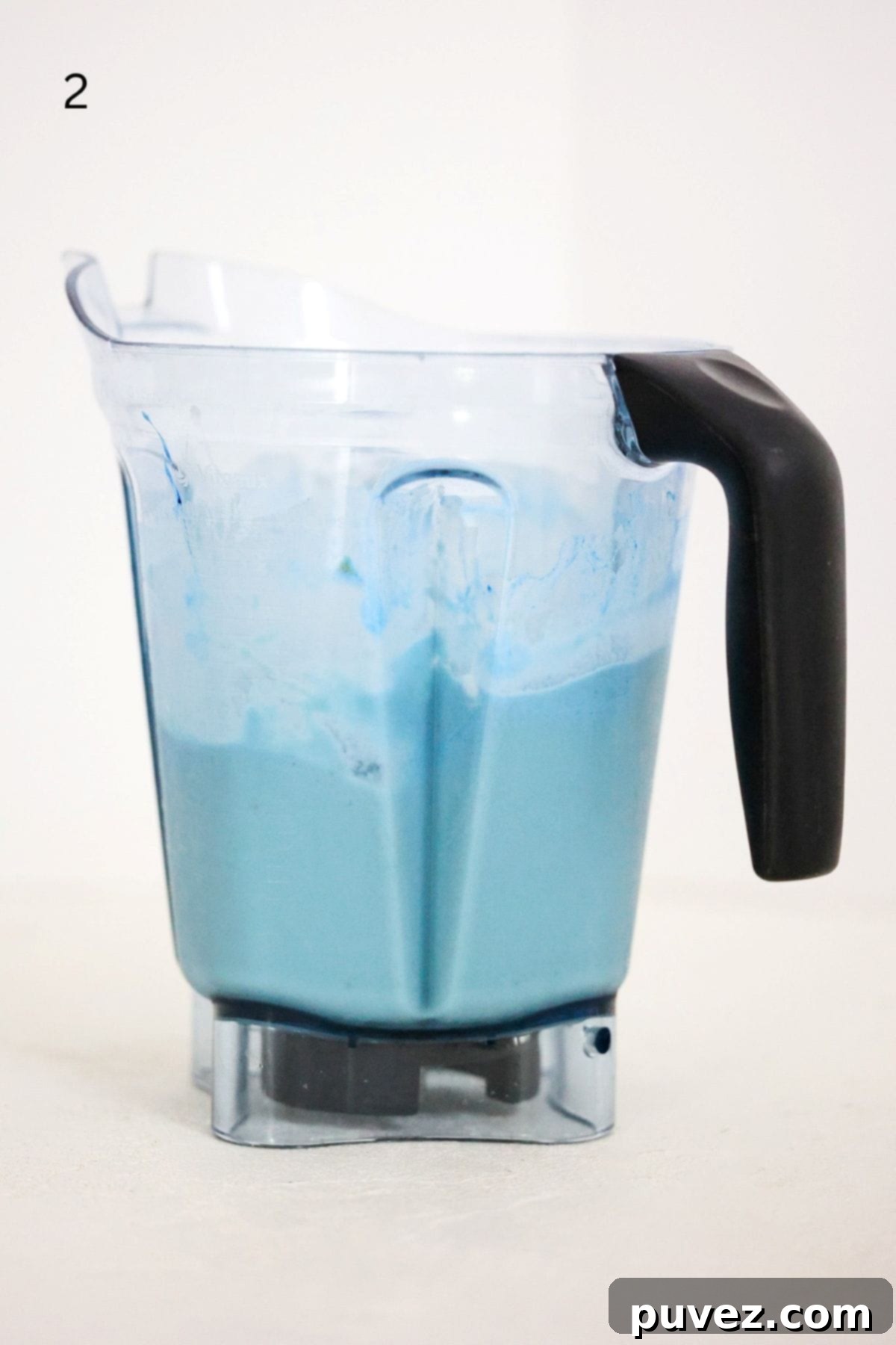 Blue spirulina smoothie bowl in a Vitamix blender.