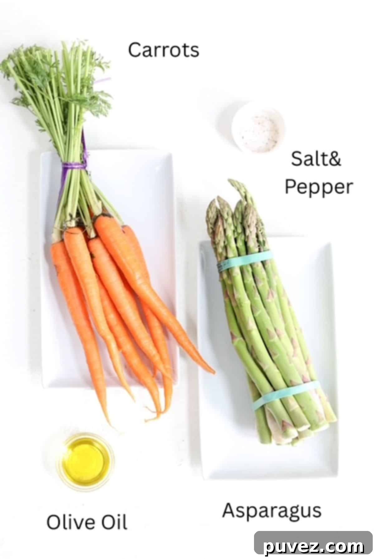 Quick and Easy Roasted Asparagus and Carrots 3 Ingredients clearly laid out for making Roasted Asparagus and Carrots, including fresh asparagus, carrots, and olive oil.