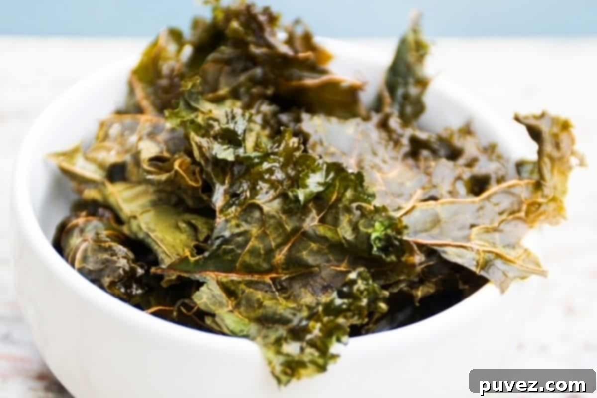 Kale chips in a white bowl.