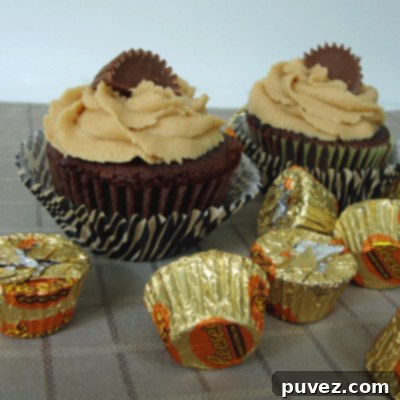 Close-up of Devil's Food Cupcakes with Peanut Butter Frosting, showcasing the rich chocolate cake and smooth peanut butter topping.