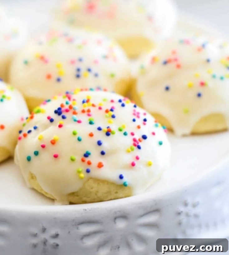 Italian Wedding Cookies on a plate.