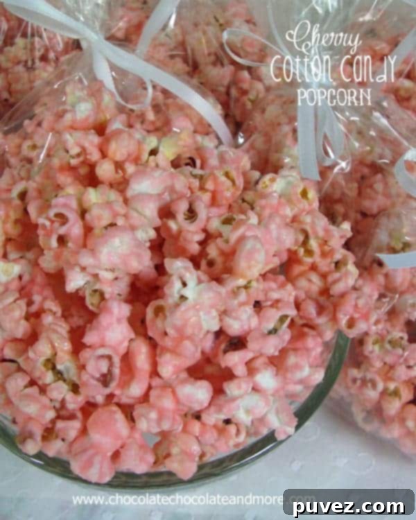 Cherry Spun Popcorn 2 Delicious Cherry Cotton Candy Popcorn, a perfect sweet treat for any occasion.