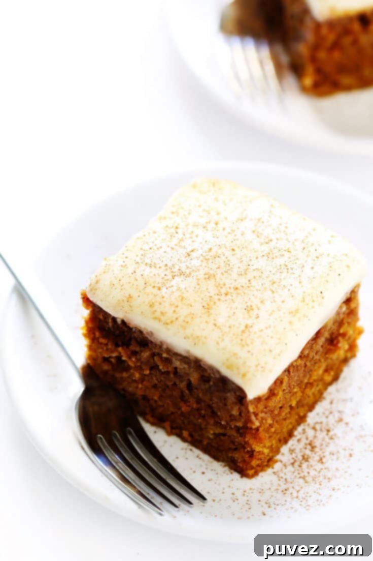 Soft Pumpkin Bars topped with a creamy, tangy cream cheese frosting.