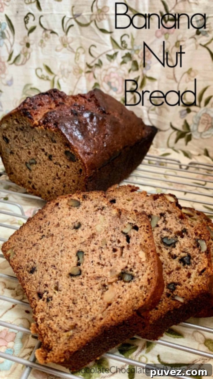Homemade Banana Nut Bread cooling on a rack, ready for slicing.