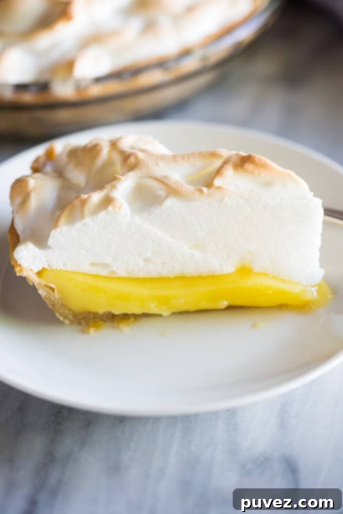 Classic Lemon Meringue Pie with a golden, toasted meringue topping.