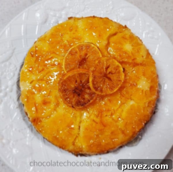 a single layer orange upside down cake, showcasing the fruit at the bottom