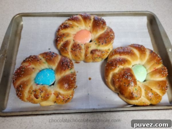 three braids of bread with Easter eggs