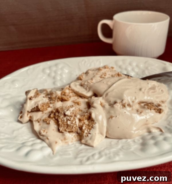 Caramel Pie Pudding scooped onto a decorative plate