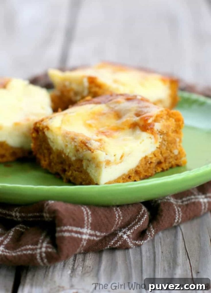 Pumpkin Cream Cheese Bars with a beautiful swirl