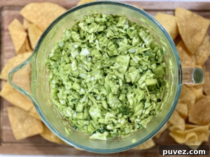 TikTok's Green Goddess Salad in a glass bowl.