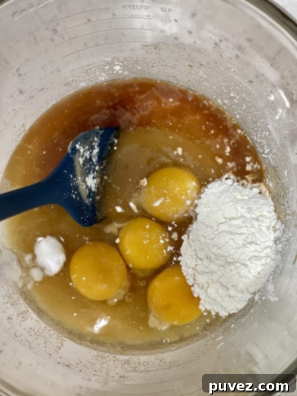 Butter and sugar mixture wit eggs, slat, cornstarch, baking soda, and vanilla not mixed in.