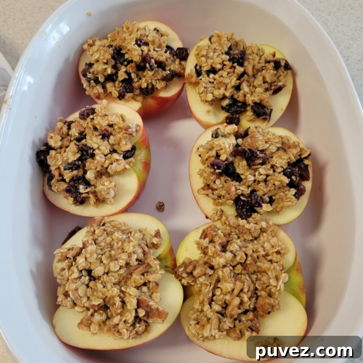 Baked apples in a baking dish, fresh out of the oven