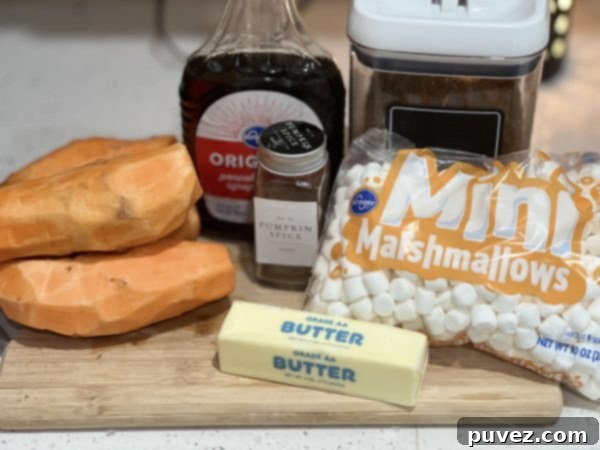 ingredients for Crock Pot Sweet Potato Casserole on a wood cutting board