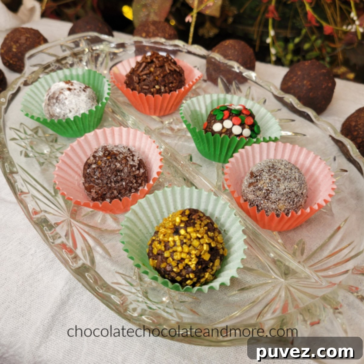 Freshly rolled Kahlua balls, some coated with cocoa powder, awaiting further decoration.