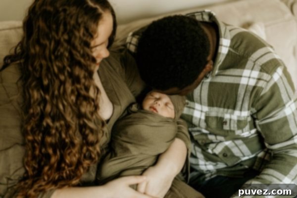 A heartwarming family photo of three sitting on a couch, celebrating new beginnings