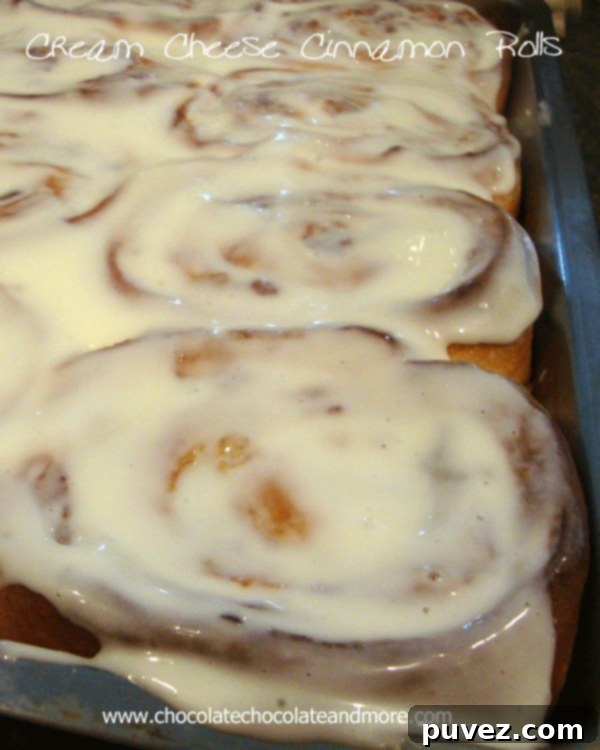 Cream Cheese Cinnamon Rolls with abundant frosting