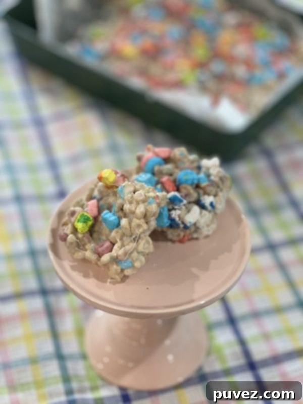 Close-up of a plate of Marshmallow Treats with Lucky Charms marshmallows