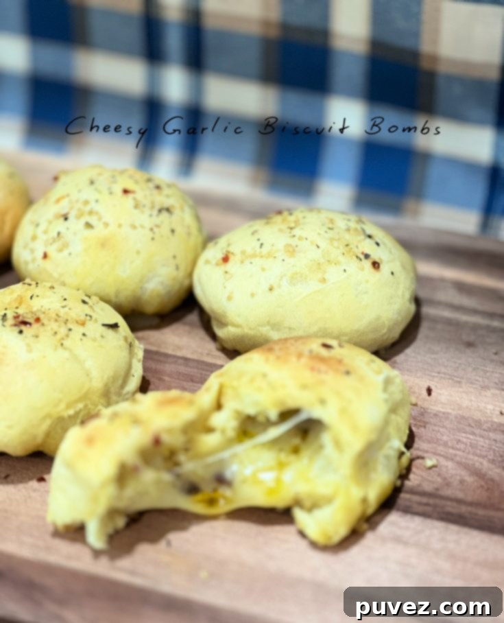 Cheesy Garlic Biscuit Bombs, an easy and quick savory snack recipe.