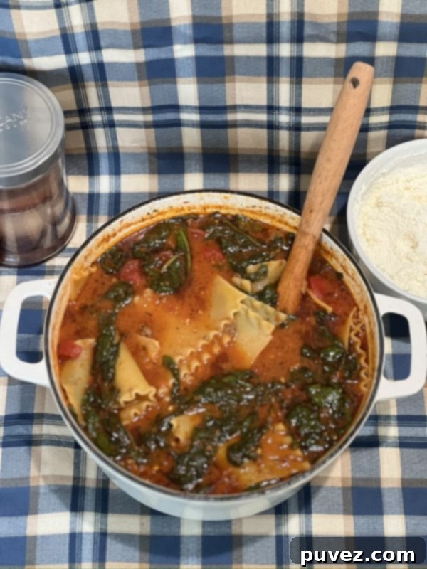Close-up of Lasagna Soup simmering in a pot