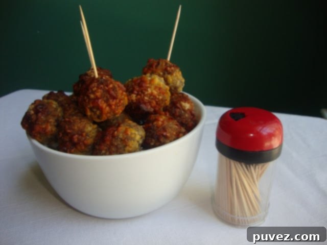 A delicious platter of golden brown sausage balls, ready for holiday guests