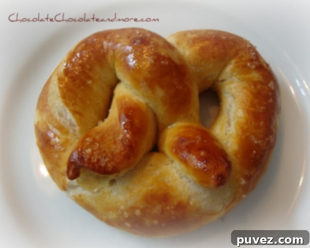 Pinterest graphic for buttery soft pretzel recipe.