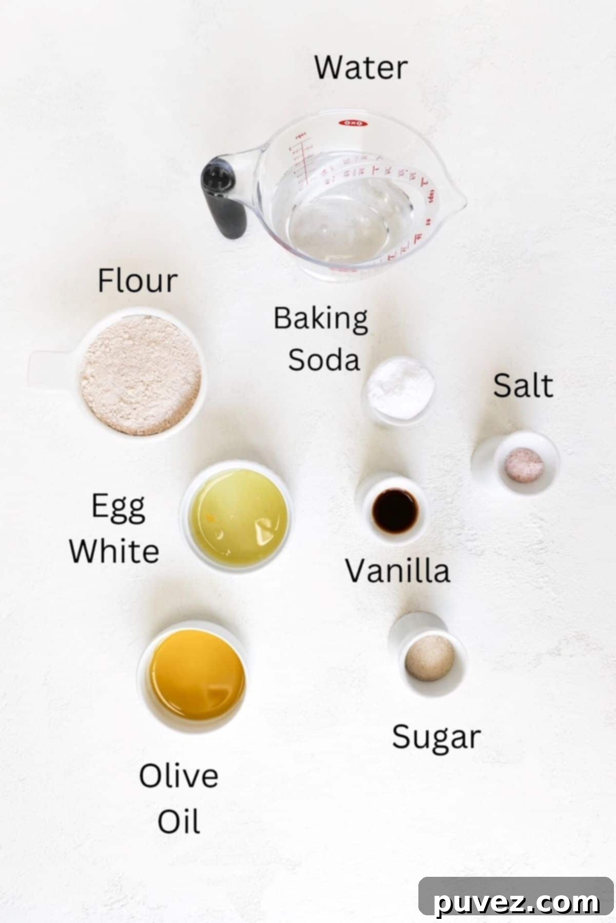 Pancakes Without Milk ingredients in separate measuring dishes, labeled.