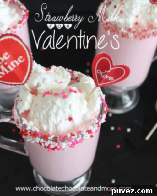 Strawberry milk with whipped cream and sprinkles