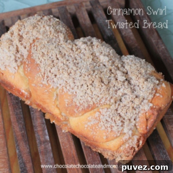 Homemade Cinnamon Swirl Twisted Bread cooling on a rack