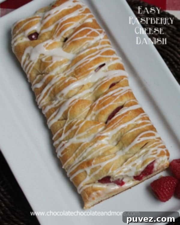 Delicious Braided Raspberry Cheese Danish ready to eat