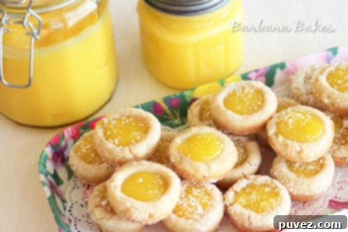 Lemon Bar Cookie Cups with buttery cookies and tangy lemon filling.