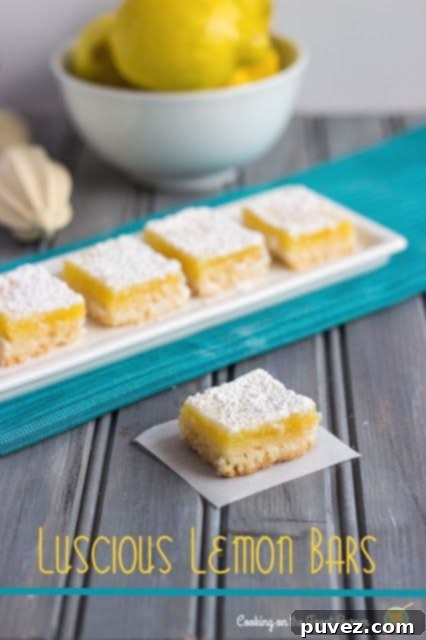 Luscious Lemon Bars with vibrant lemon filling and buttery shortbread crust.