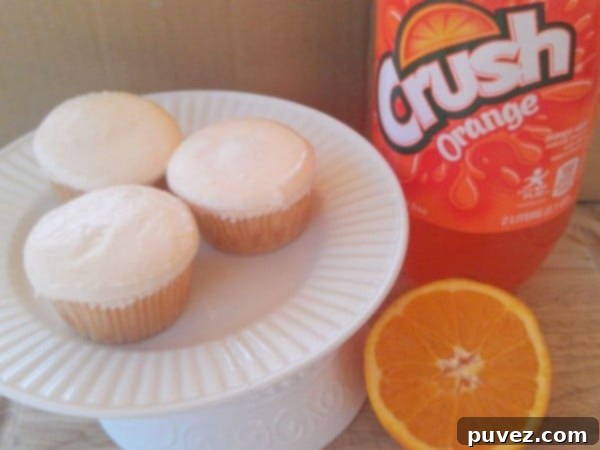 Orange Crush Cupcakes, vibrant and infused with iconic orange soda flavor.