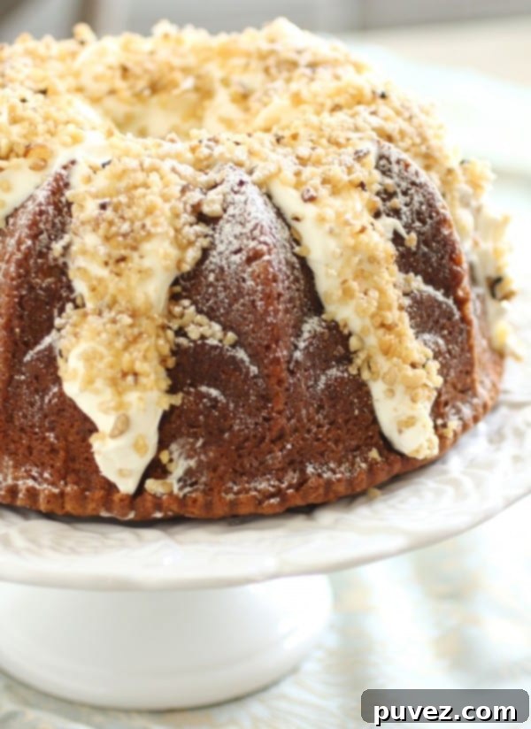 Italian Cream Bundt Cake - An elegant and moist Bundt cake featuring coconut, pecans, and a delicate crumb.