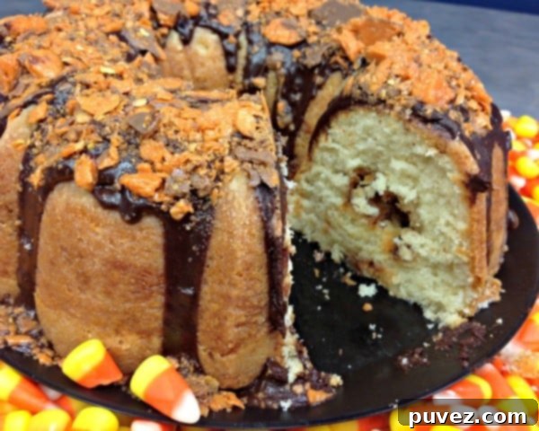 Butterfinger Bundt Cake - A fun Bundt cake featuring crushed Butterfinger candy for a sweet and crunchy twist.