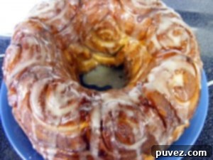 Cinnamon Roll Cake - A delightful Bundt cake that captures the warm, sweet flavors of a classic cinnamon roll.